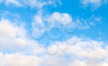 Bright cloudy blue sky background texture