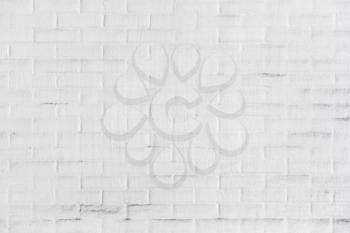 White brick wall with plastering layer, background photo texture