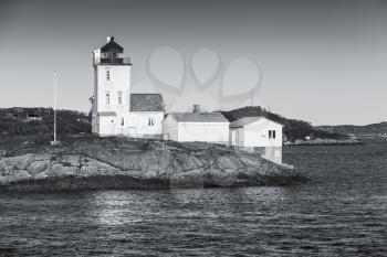 Tyrhaug Lighthouse. Coastal lighthouse located in Smola Municipality, Norway. Black and white photo