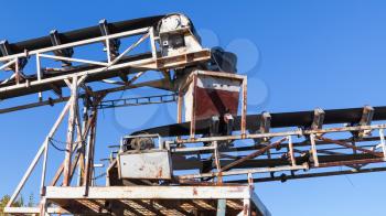 Industrial transporter fragment over blue sky background