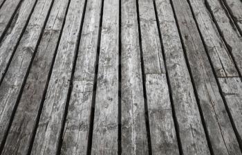 Natural gray wooden floor. Background photo texture with perspective effect