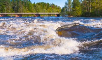 Langinkoski, fast running river water in Kotka, Finland