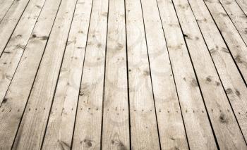 Natural wooden floor. Background photo of pier texture with perspective effect
