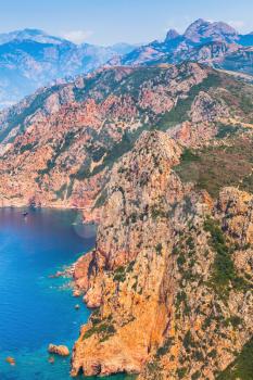 Rocks and sea in summer season. Landscape of French mountainous Mediterranean island Corsica. Corse-du-Sud, Piana