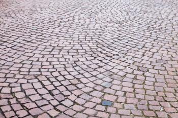 Granite cobblestone road pavement pattern. Background photo texture