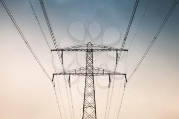 Transmission power tower, electricity pylon, front view. Steel lattice tower, used to support an overhead power line