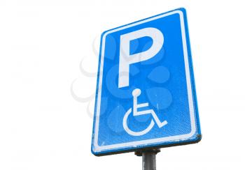Disabled parking permit, blue road sign isolated on white background, close up photo