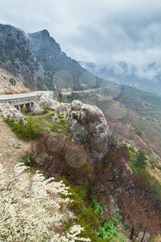 Crimea peninsula, Black Sea. Coastal vertical landscape of Laspi district in foggy spring cloudy day