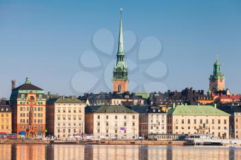Cityscape of Gamla Stan city district in central Stockholm, German Church spire as a skyline dominant