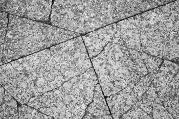 Cracked gray granite. Stone floor, flat background texture