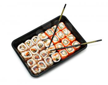 Big colorful sushi set and chopsticks isolated on white