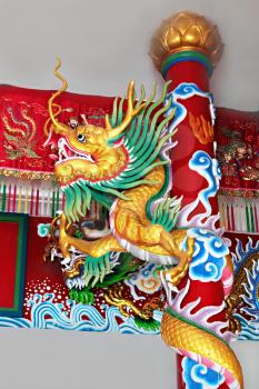 KOH-PHANGAN, THAILAND - JANUARY 18: Dragon at Kuan Yin temple on January 18, 2011, Koh-Phangan island, Thailand. Kuan Yin temple is the main buddhist temple and meditation center on Koh Phangan