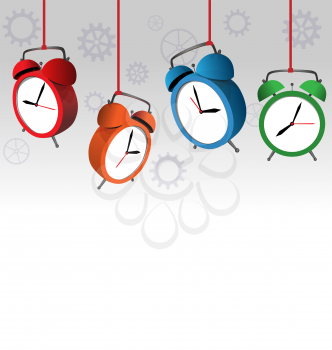 Four multicolored alarm clocks on gray background
