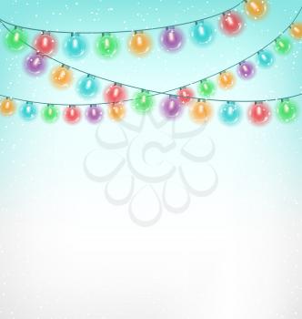 Multicolored circle Christmas lights garlands in snowfall on sky background