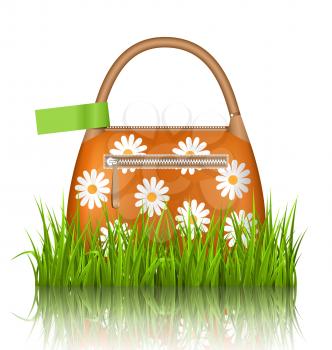 Orange woman spring bag with chamomiles flowers and green sticker in grass lawn with reflection on white background