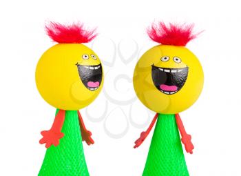 Two smiling chicken toys isolated on white background
