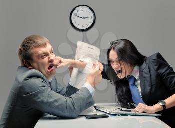 Two young caucasian office worker starting to fight