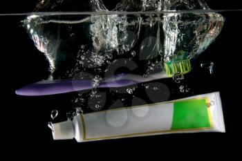 Toothpaste and toothbrush under water