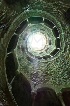 Light in the end of the spiral stairs. Toned image