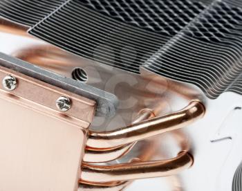 Close-up of modern computer processor cooler with copper pipes