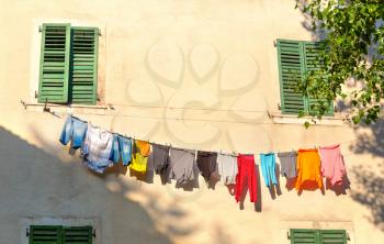 Colorful cloth is drying on the street of Montenegro