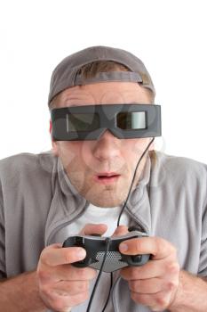 Surprised player with joystick and 3-D glasses. Isolated on white