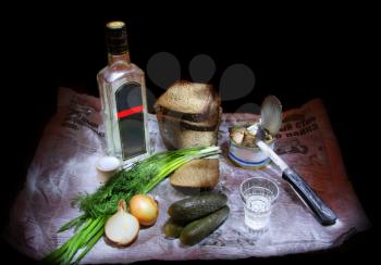 Traditional russian still life. Vodka, bread and vegetables