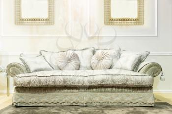 Luxury  interior with nice big white sofa