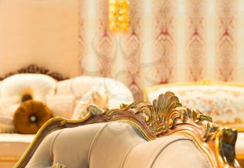 Luxury beige interior with nice chair closeup picture