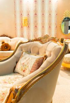 Luxury beige interior with nice chair closeup