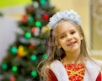 Happy little girl at Christmas party