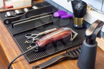 Close up of barber's accessories on the table