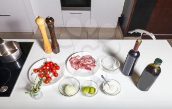 Top view of ingredients for preparing meat on the table