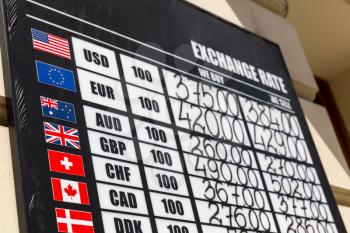 Exchange rate board with multiple currencies. Money sell information display
