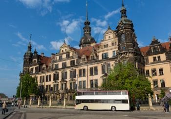 Tour bus at European attractions, castle. Summer tourism and travels, ancient architecture and buildings, famous europe landmark