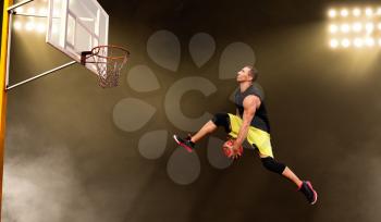 Basketball player makes a throw, shoot in jump, dark background. Male athlete in sportswear scores on streetball training