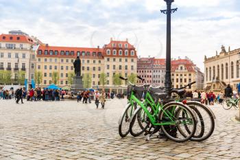 Bicycle parking on the square, old European town. Summer tourism and travels, famous europe landmark, popular places and streets