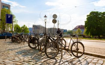 Bicycle parking in ancient European city. Summer tourism and travels, famous europe landmark, popular places