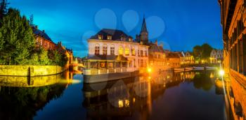 Belgium, Brugge, old European town with buildings on river, night view. Tourism and travels, famous europe landmark, popular places