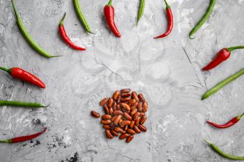 Beans and red pepper isolated on grunge abstract background, top view. Organic vegetarian food, grocery assortment, natural eco products, healthy lifestyle concept