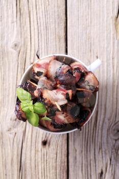 Bowl of delicious bacon-wrapped prunes - overhead
