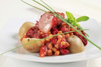 Red beans and corn in tomato sauce with sausage and potatoes