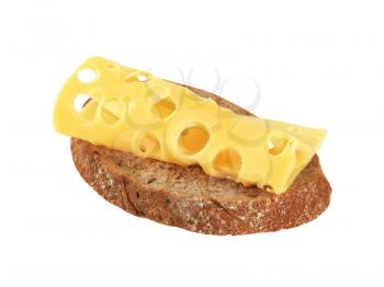 Slice of brown bread with Swiss cheese