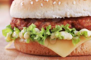 Detail of cheeseburger with mayonnaise