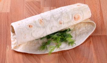 Burrito - Wheat flour tortilla wrapped around a filling