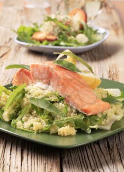 Slow roasted salmon fillet on a bed of couscous salad 
