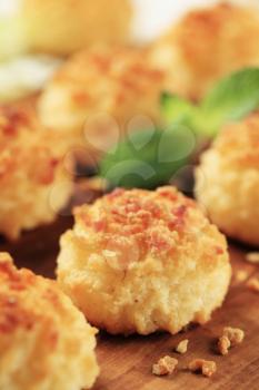 Coconut macaroons sprinkled with chopped nuts
