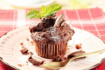 Double chocolate muffin on a pink plate