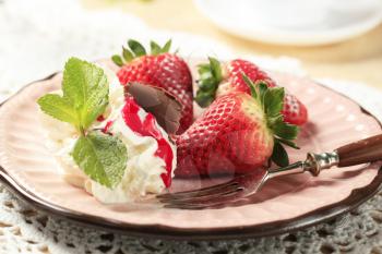 Fresh strawberries with whipped cream