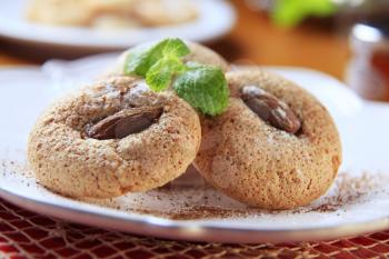 Crispy almond macaroons on a plate - detail